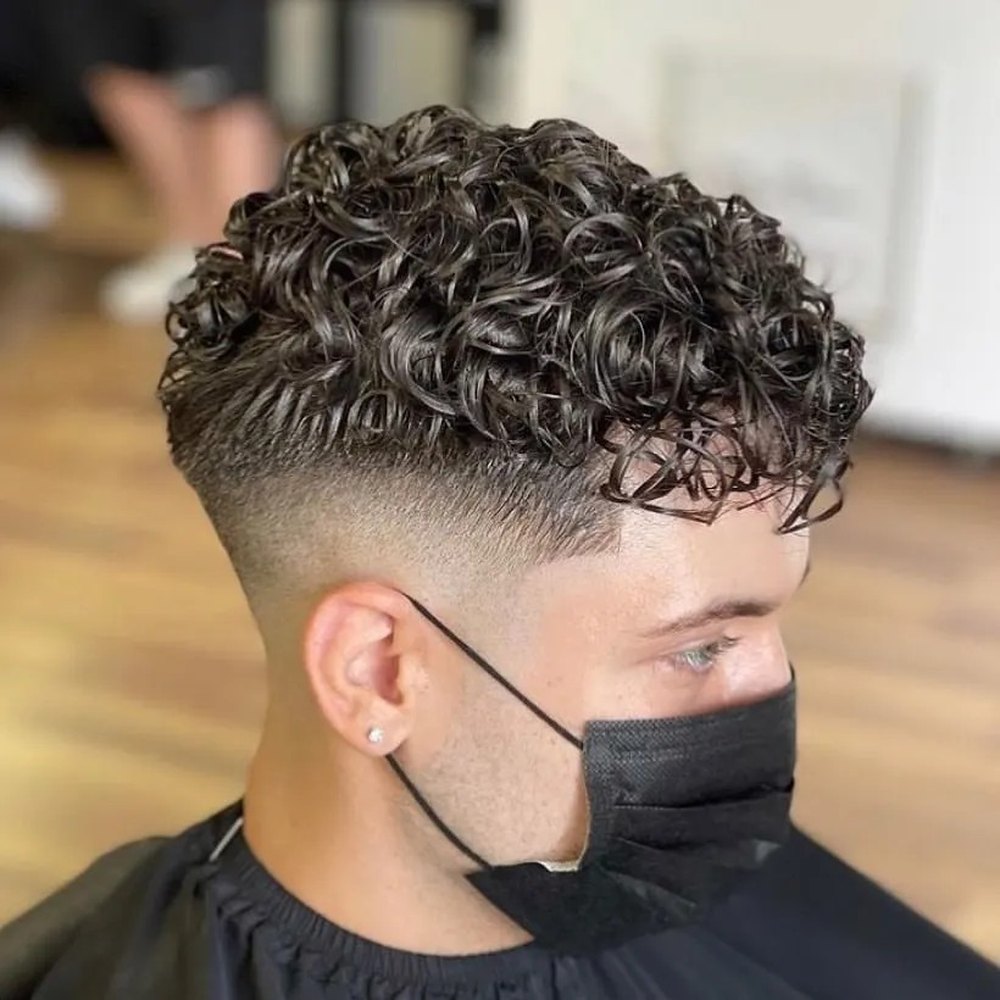 Toupet afro bouclé 20 mm - cheveux humains